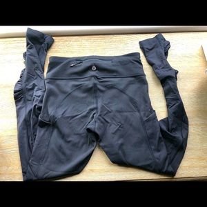 Black lululemon leggings size 4 with super cute rouched detailing on the legs.
